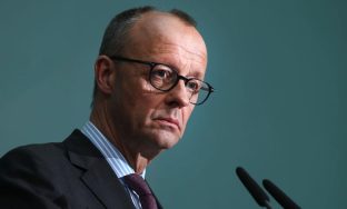 BERLIN, GERMANY - MARCH 03: German designated chancellor and leader of the German Christian Democrats (CDU) Friedrich Merz speaks to the media the day after the Hamburg city-state election on March 03, 2025 in Berlin, Germany. Merz is under pressure to negotiate the formation of the next federal government coalition quickly in order to help strengthen Europe's position over defence and its relationship to the USA. (Photo by Sean Gallup/Getty Images)