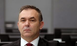 epa08813004 Rexhep Selimi, a deputy in the Kosovo parliament, appears before the Kosovo Specialist Chambers in The Hague, Netherlands, 11 November 2020. Rexhep Selimi is the latest former Kosovo Liberation Army leader and is charged with crimes against humanity and war crimes.  EPA-EFE/EVA PLEVIER / POOL