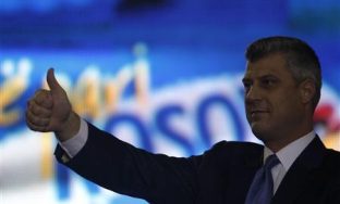 Kosovo's incumbent Prime Minister and leader of the Democratic Party of Kosovo (PDK) Hashim Thaci gestures at supporters during a pre-election rally in Pristina December 10, 2010.       REUTERS/Oleg Popov